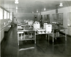 A Home Economics classroom from Kingswood School, 1932.  Ironically, there's no kitchen sink in sight.