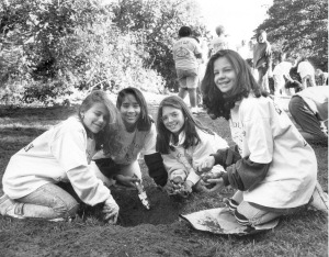 Middle School girls planting daffodils for Earth Day, 1990