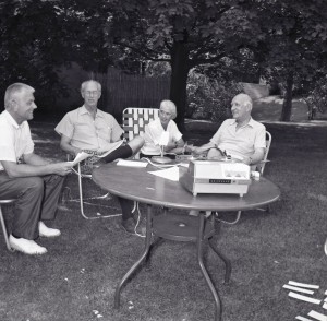 From left: Carleton McClain, Henry S. Booth and Margaret Russell interviewing former Cranbrook School Headmaster, Harry Hoey at his home, 1964.