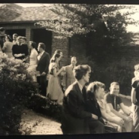 Guests gather in the Saarinen residence courtyard, ca 1938.