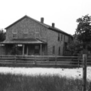 Abandoned building from the House of David Colony on High Island. Referred to as the "Main House." Photo by Robert Hatt. Courtesy Cranbrook Archives.